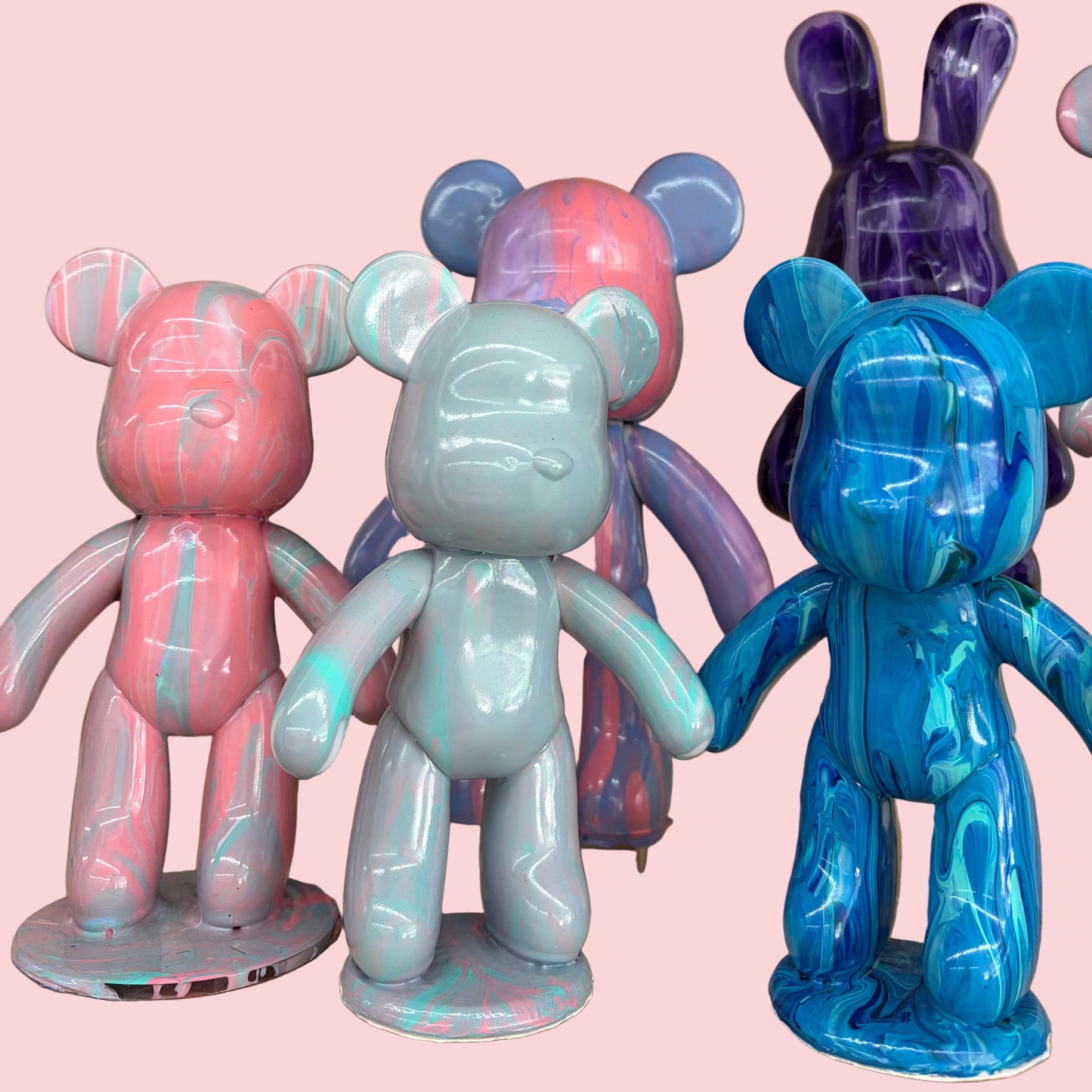 Completed fluid art bear figures in pink blue and purple at XPOP Art Craft Lisle IL