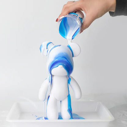 Fluid acrylic pour painting on bear figure craft activity at XPOP Art Craft Lisle IL